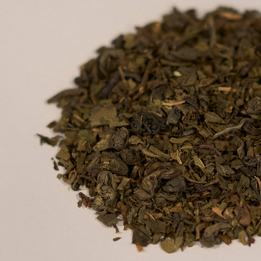 Moroccan Mint loose-leaf tea by Tea & Hammock with fresh mint leaves