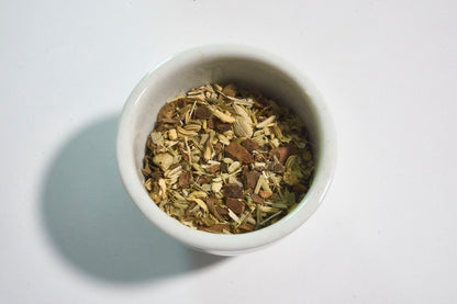 white bowl with Ayuervedic herbal tea blend Pause