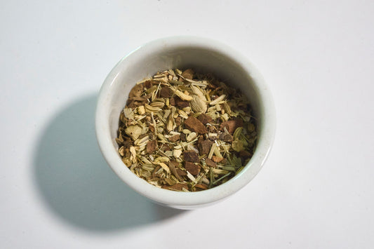 white bowl with Ayuervedic herbal tea blend Pause