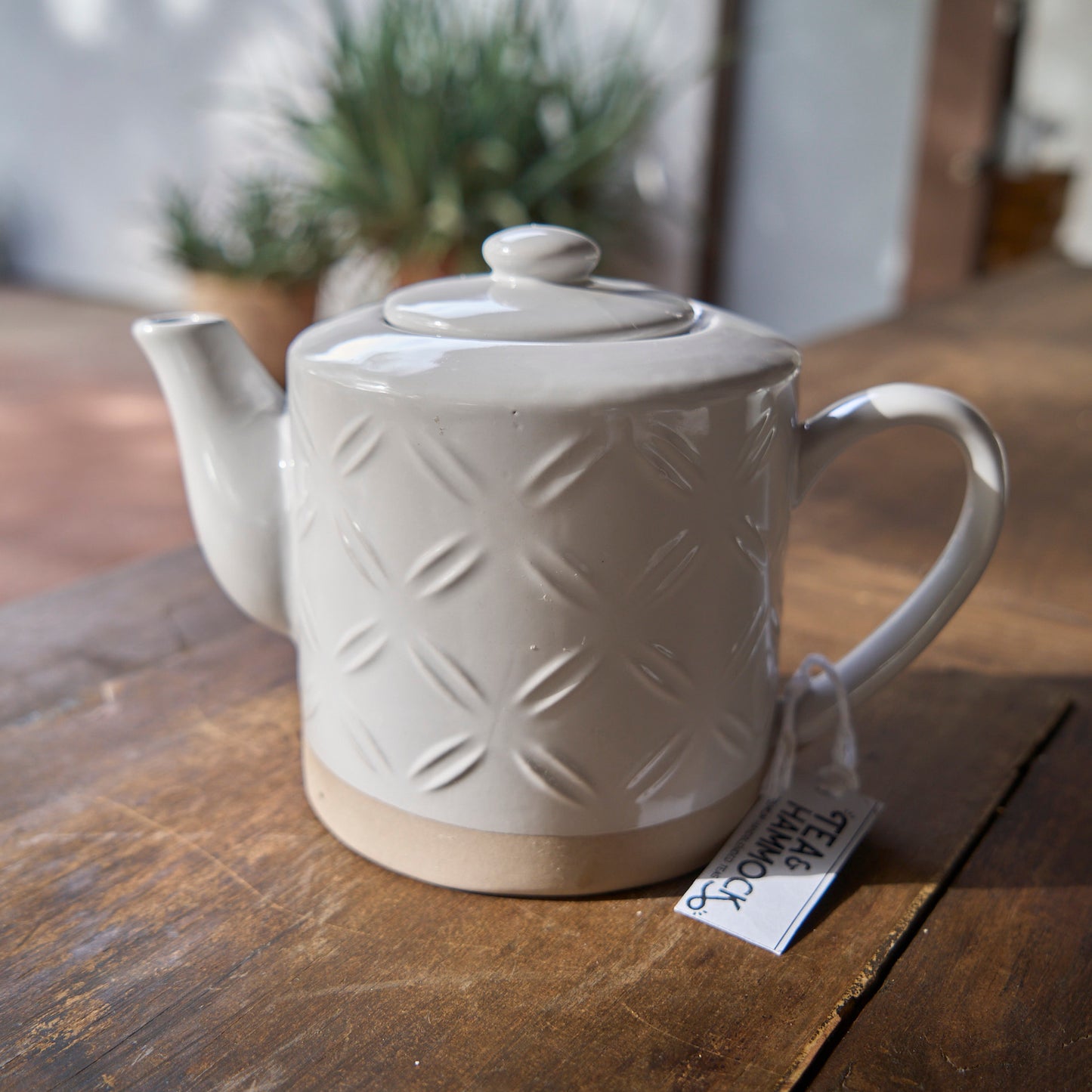 White ceramic teapot